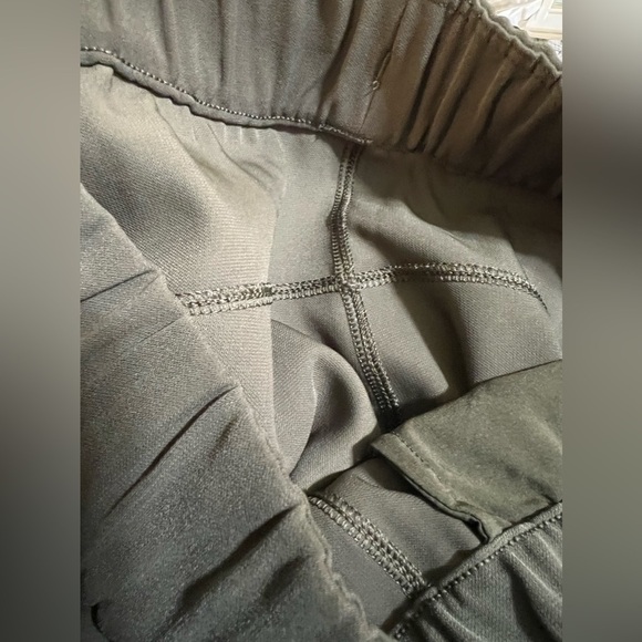 W2. Lululemon Pants On the Fly Crop *Woven 23" Dark Olive - Picture 10 of 14
